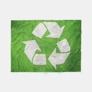 Recycle ein Symbol auf Grunge Hintergrund. Grünes Fleecedecke