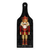 Red and Gold Nutcracker auf Black Schneidebrett (Vorderseite)