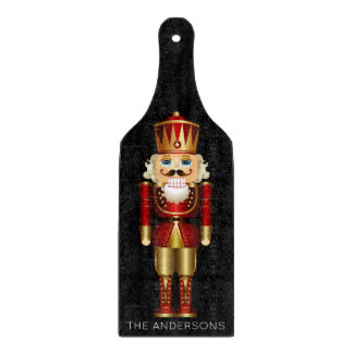 Red and Gold Nutcracker auf Black Schneidebrett