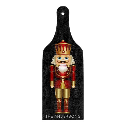Red and Gold Nutcracker auf Black Schneidebrett (Vorderseite)