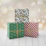 Red Berry Twigs Mixed Christmas Patterns Geschenkpapier Set<br><div class="desc">Rote,  grüne und weiße Weihnachtsblätter mit Mustern in passenden Farben: eine mit grünen Zweigen voller roter Beeren. Eine mit roten und weißen Pfefferminzstreifen. Und einer in Grün mit weißer Linie Kunst der Beerenzweige.</div>