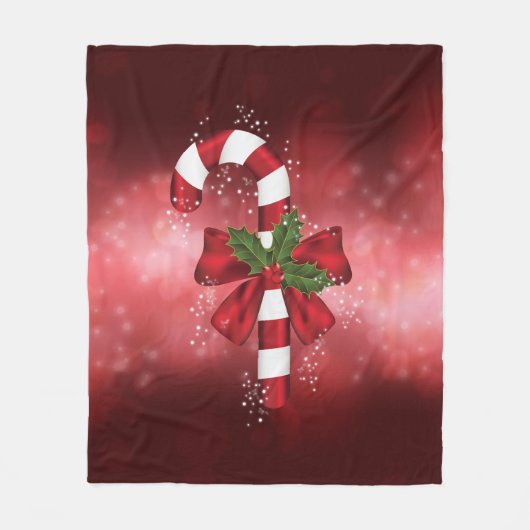 Red Candy Cane auf einem roten Bokeh Hintergrund Fleecedecke (Vorderseite)
