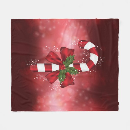 Red Candy Cane auf einem roten Bokeh Hintergrund Fleecedecke (Vorderseite (Horizontal))