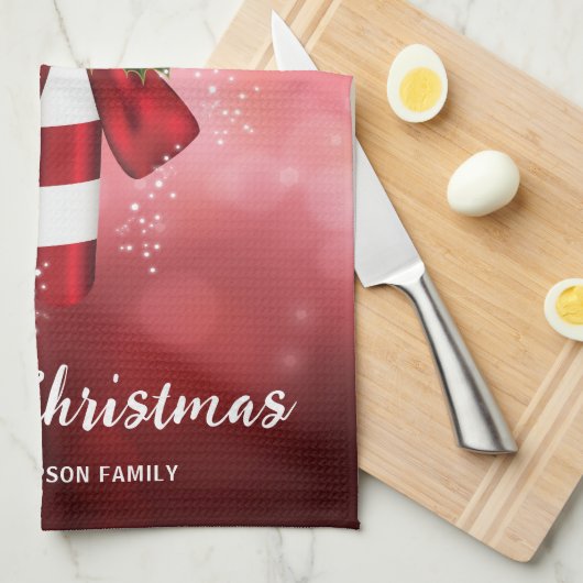 Red Candy Cane auf einem roten Bokeh Hintergrund Geschirrtuch (Viertel Falte)