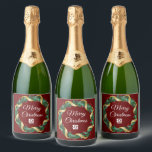 Red Christmas Wreath Custom Company Logo Party Schaumweinetikett<br><div class="desc">This beautiful company Christmas champagne label is custom made with your business logo within a festive holly berry wreath with gold garland wrapping on a red background. Contemporary holiday labels for your client or corporate employee presents.</div>