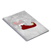 Red Elf Shoe mit Candy Canes auf Bokeh Hintergrund Notizblock (Rechte Seite)