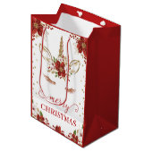 Red & Gold Poinsettia Unicorn Gesicht Frohe Weihna Mittlere Geschenktüte (Vorderseite Schrägansicht)