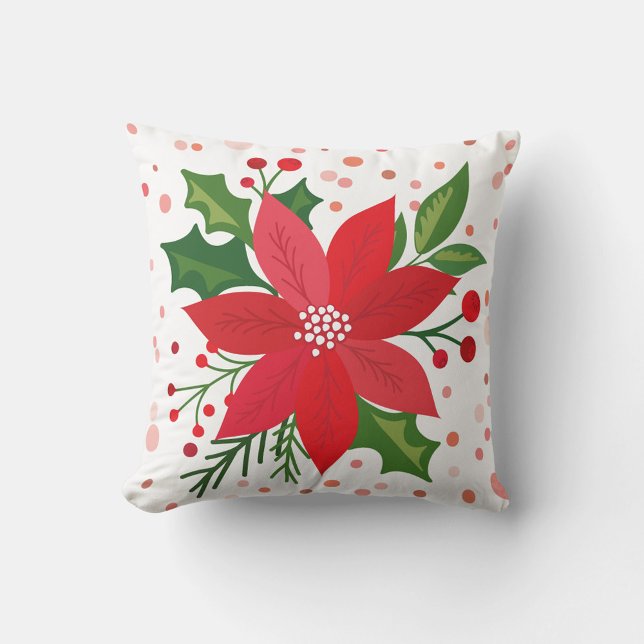 Red Poinsettia Kissen (A square throw pillow features a festive holiday design.)