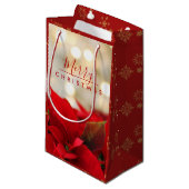 Red Poinsettias mit Golden Bokeh Weihnachten Kleine Geschenktüte (Vorderseite Schrägansicht)