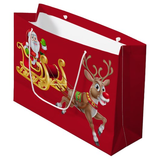 Red Santa Reindeer auf Sleigh Frohe Weihnachten Große Geschenktüte (Vorderseite Schrägansicht)
