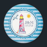 Red Striped Watercolor Lighthouse Wedding Magnet<br><div class="desc">A wedding magnet with a nautical theme. Designed on a blue striped pattern and a circular nautical frame layered over top. A red striped lighthouse and a beach ball, with a smiling sun and seagull flying off in the distance positioned inside the frame. Personalize with your initials and wedding date....</div>