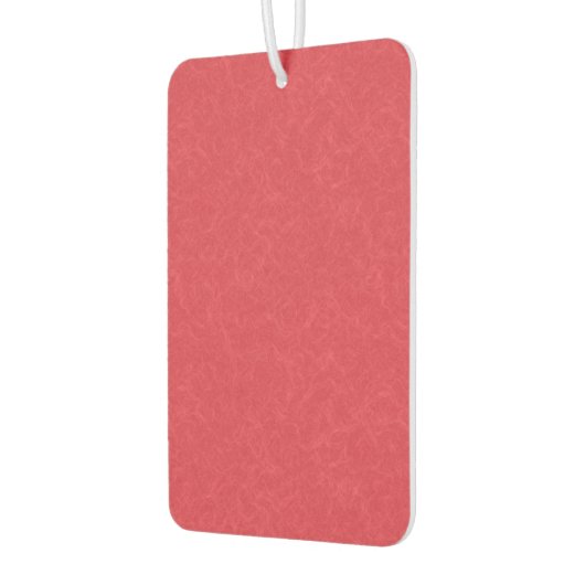 Red textured surface with subtle swirling pattern autolufterfrischer (Links)