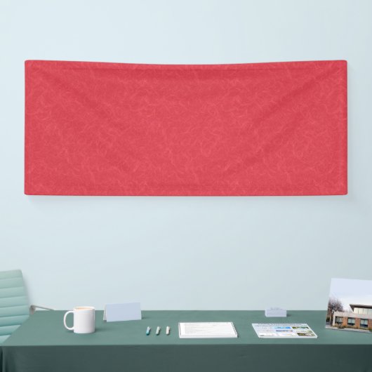 Red textured surface with subtle swirling pattern banner (Messe)