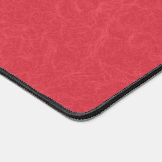 Red textured surface with subtle swirling pattern schreibtischunterlage (Ecke)