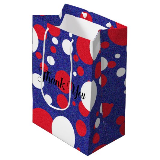 Red White Blue Sparkle Polka Dot Party Mittlere Geschenktüte (Vorderseite Schrägansicht)