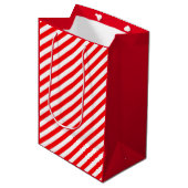 RED WHITE CHRISTMAS CANDY CANE STIL MITTLERE GESCHENKTÜTE (Vorderseite Schrägansicht)