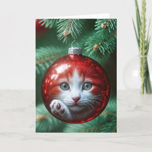 Reflektion der Katze in einem roten Ornament Feiertagskarte