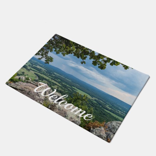 Regen geleitet zu Petit Jean Willkommensheimatte Fußmatte (Schrägansicht)