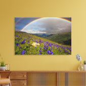 Regenbogen über einer blühenden Wiese Leinwanddruck (Insitu (Wohnzimmer))