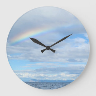 Regenbogen über Insel Große Wanduhr