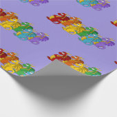 Regenbogenfarbene Drachen Cartoon Geschenkpapier (Ecke)