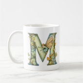 Regenbogenfee Anfangsbuchstabe 'M' Kaffeetasse (Links)