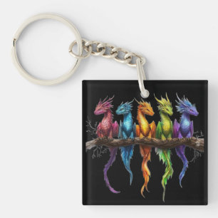 Regenbogengruppe von Baby-Drachen auf Schwarz Schlüsselanhänger