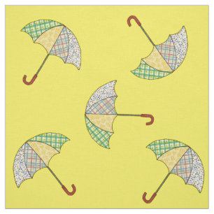 Regenschirme auf gelbem Stoff