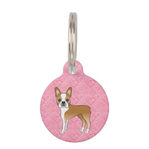 Rehbrauner und weißer Boston Terrier Hund auf rosa Haustiermarke
