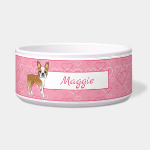 Rehfarbener Boston Terrier Hund auf rosa Herzen un Napf