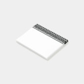 Reihen der Schwarzweiss-Gekritzel-Muster Post-it Klebezettel (angewinkelt)