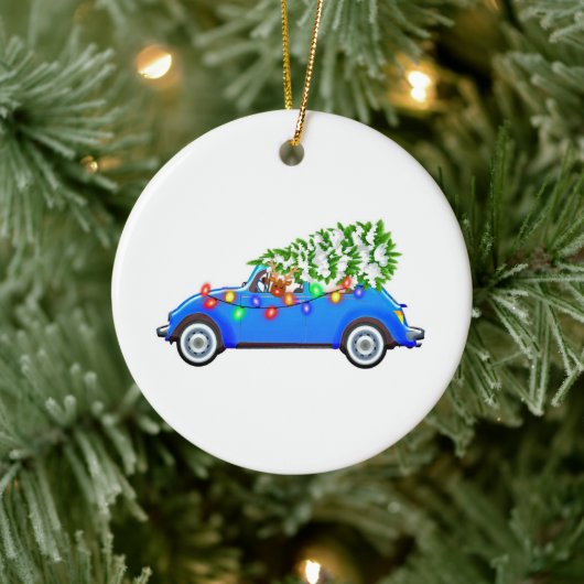 Reindeer driving a beetle with christmas treeb keramik ornament (Baum)