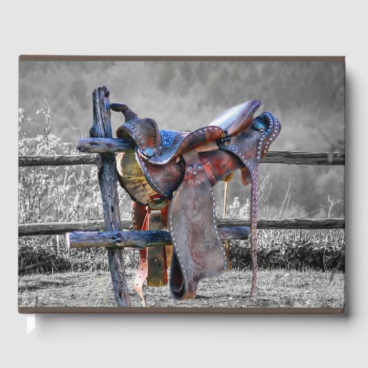 Reitsattel auf dem Corral Fence Western Gästebuch (Vorderseite)