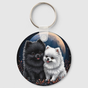 Reizende schwarze und weiße Pomeranian-Welpen Schlüsselanhänger