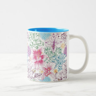 Reizendes Muster mit bunten Blumen Zweifarbige Tasse