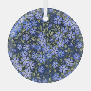 Reizvolle verstreute Immergrün-Blüten in Tiefblau Ornament Aus Glas