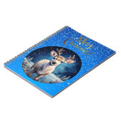 Rentier mit fröhlichem Weihnachtskranz-Gruß Notizblock (Linke Seite)