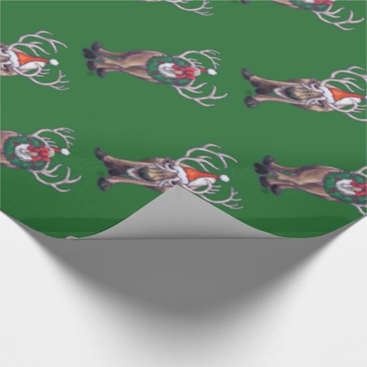Rentierweihnachtsfest auf Green Geschenkpapier (Ecke)