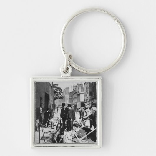 Reparieren eines Rohres Schlüsselanhänger (Vorne)