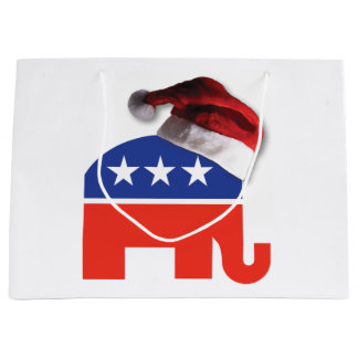 Republikanischer Elefant, der einen Weihnachtsratt Große Geschenktüte