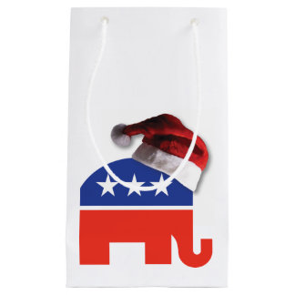 Republikanischer Elefant, der einen Weihnachtsratt Kleine Geschenktüte