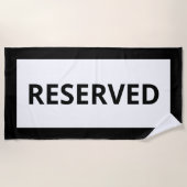 Reserviertes weißes Schwarzstrand-Handtuch Strandtuch (Vorderseite)