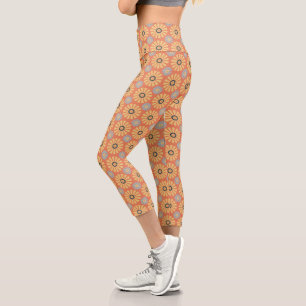 Retro abstraktes Muster mit blauen und orangen Gän Capri Leggings
