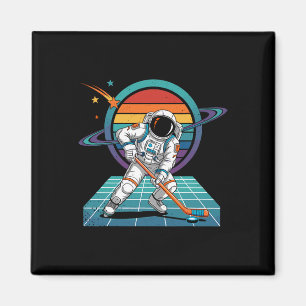 Retro-Astronaut spielt Hockey im kosmischen Univer Magnet