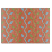 Retro Blue & Green Vines auf orangefarbenem Muster Schneidebrett (Vorderseite)