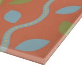 Retro Blue & Green Vines auf orangefarbenem Muster Schneidebrett (Ecke)