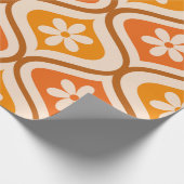 Retro-Blumen auf orangefarbenem und bernsteinfarbe Geschenkpapier (Ecke)