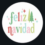 Retro Christmas | Feliz Navidad Runder Aufkleber<br><div class="desc">Dieser spielerische Aufkleber enthält das Sprichwort "Feliz Navidad" mit abwechselnden Farben und funkelnden Akzenten. Die Farben sind rosa,  rot,  grün und hellblau.</div>