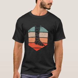 Retro gebrochenes Bein - Verletzung am gebrochenen T-Shirt
