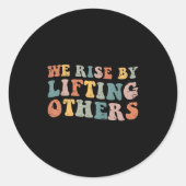 Retro Groovy We Rise By Lifting Others Motivationa Runder Aufkleber (Vorderseite)